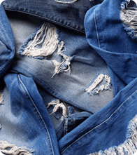 Distressed denim fabric